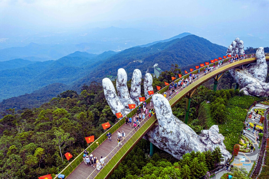 Golden Bridge held by giant hands Ba Na Hills Da Nang Vietnam – Auasia Travel